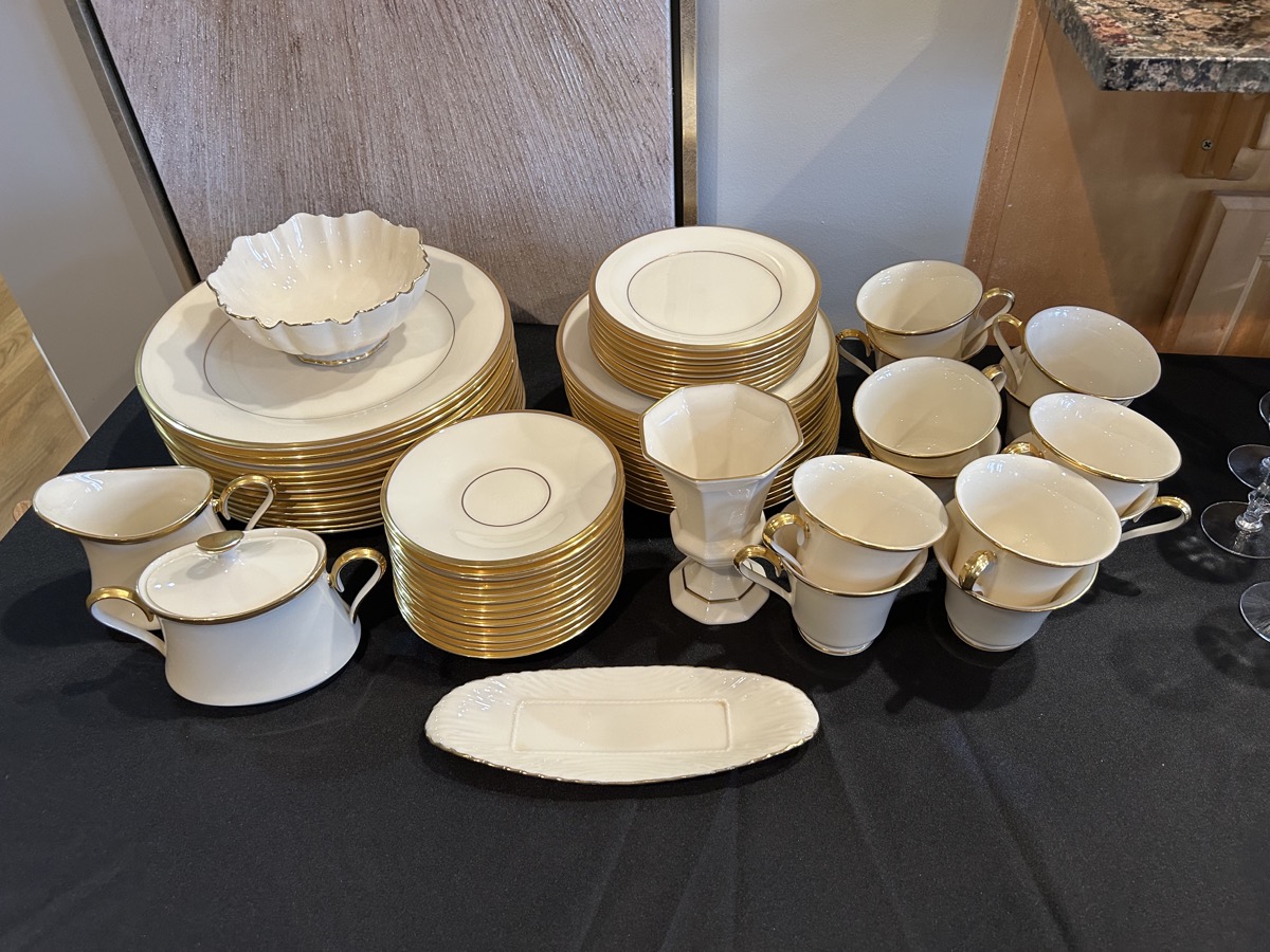 Gold-rimmed china dinnerware set