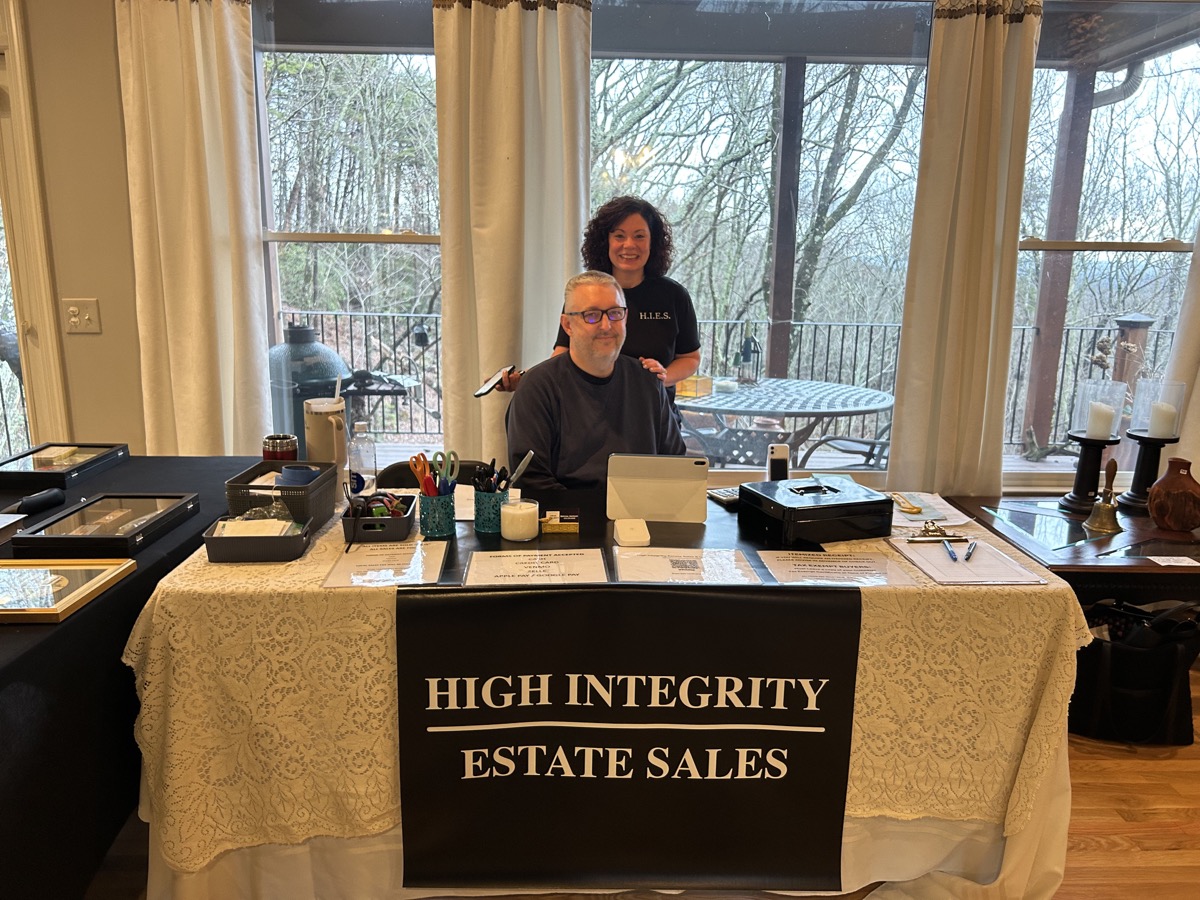 Russell and Melissa at the checkout table